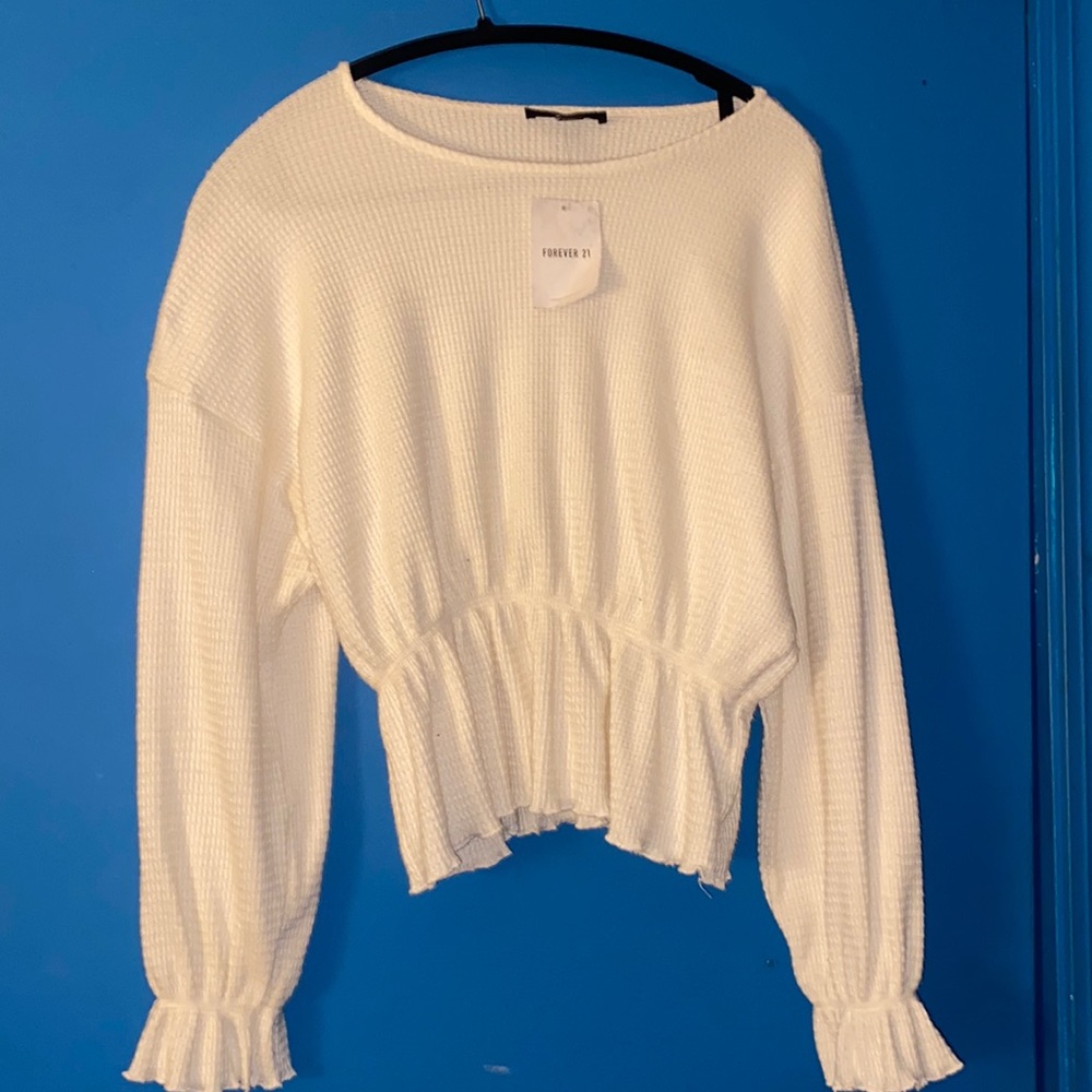 Forever 21. Cream color top. Lots of stretch!! Medium